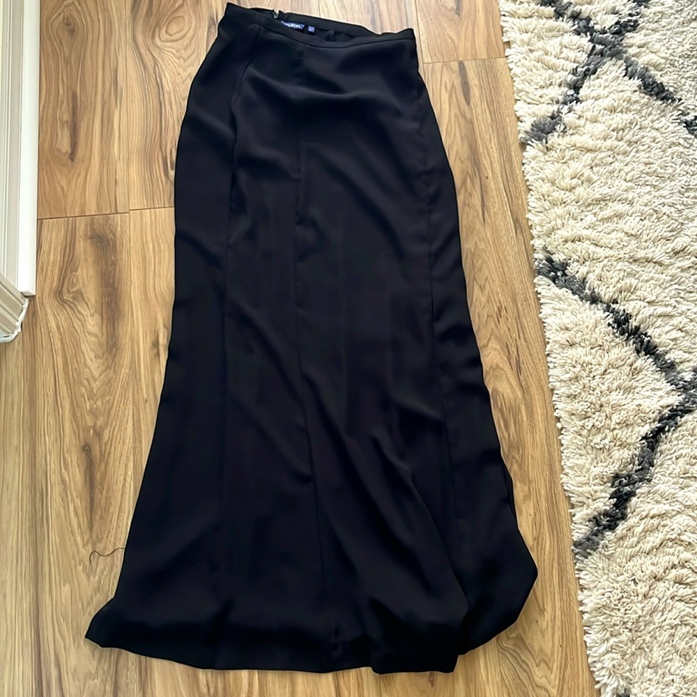 Long form fitting black skirt